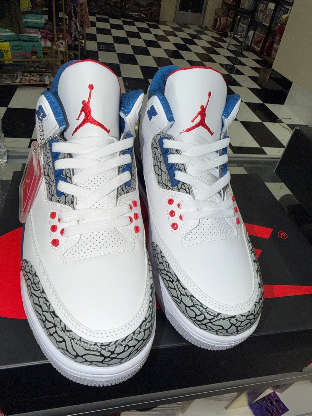 Jordan men’s  White/Red/Blue Retro Sneakers